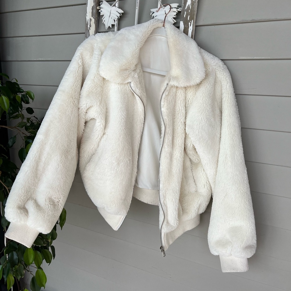 Bright white puffer coat